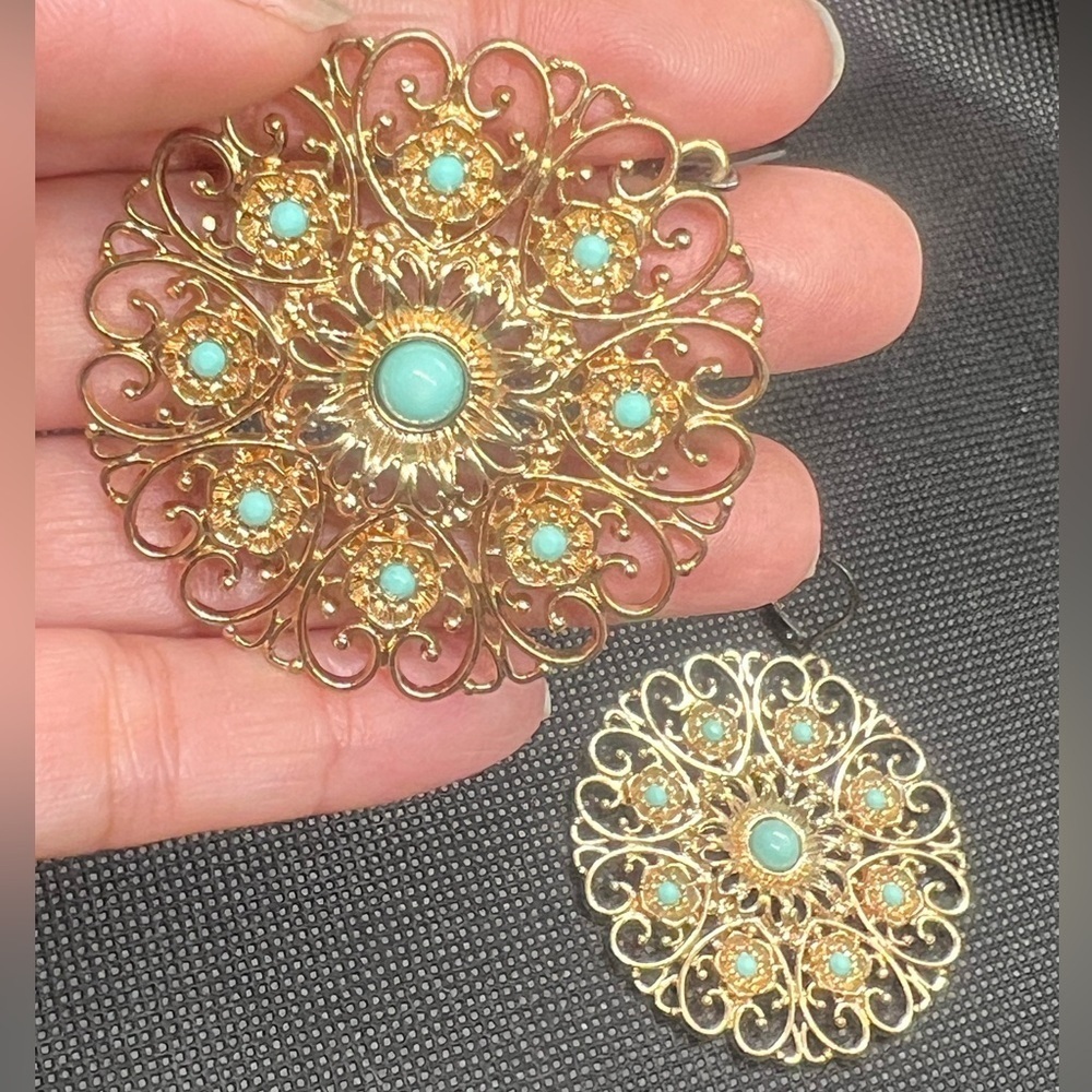 Charming Charlie teal and gold toned round mandala statement earrings